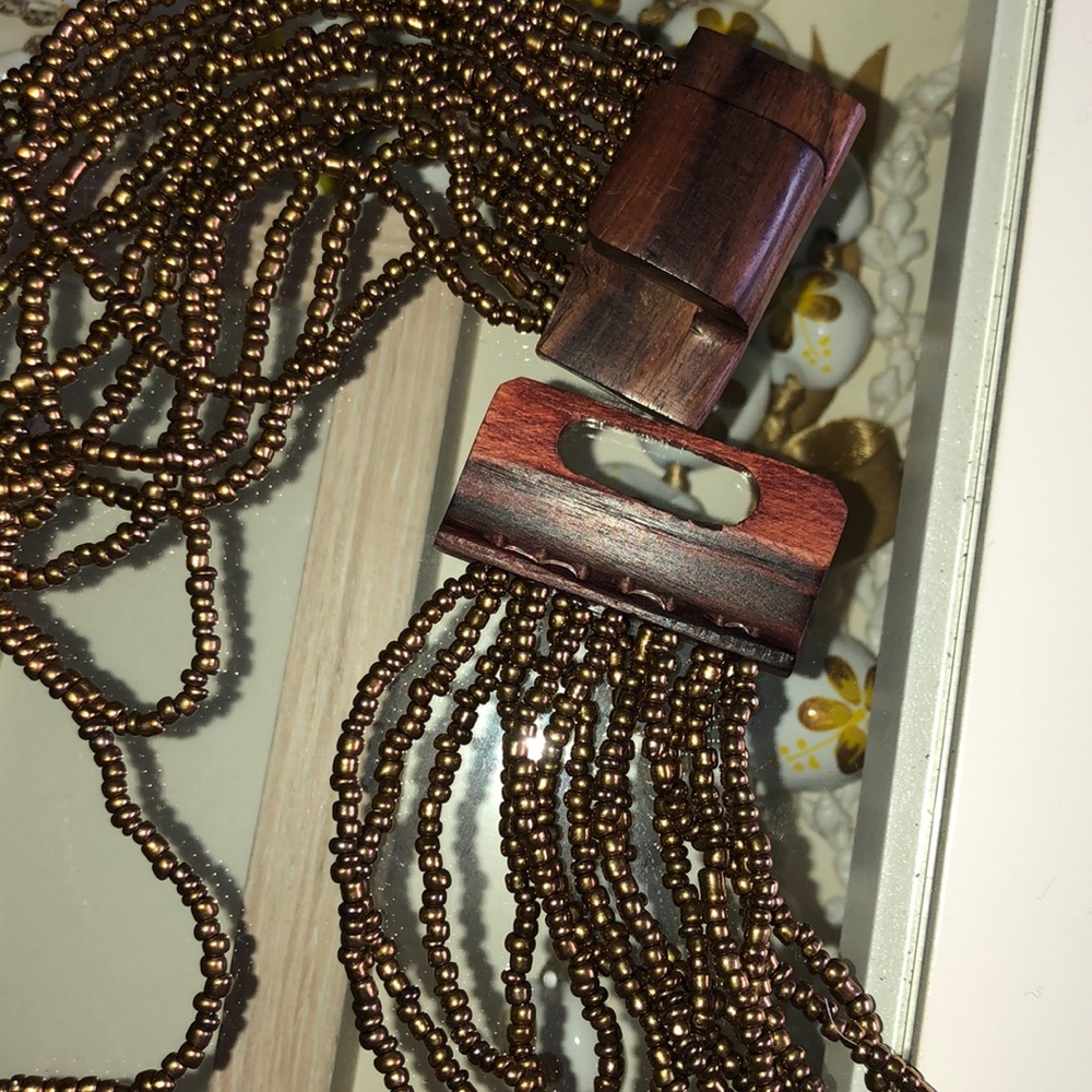 Artisan beaded necklace with koa wood clasp